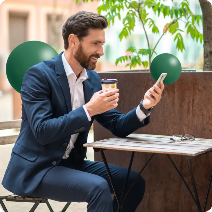 Traveler activating his eSIM at a café